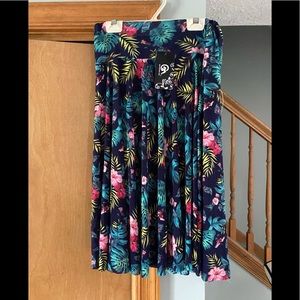 Pleated flower skirt with built-in shorts. NWT